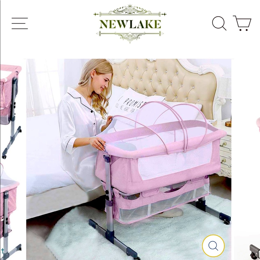 Pink baby bassinet